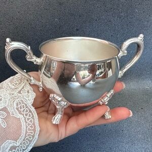 Elegant silver coated Creamer with Ornate Handles